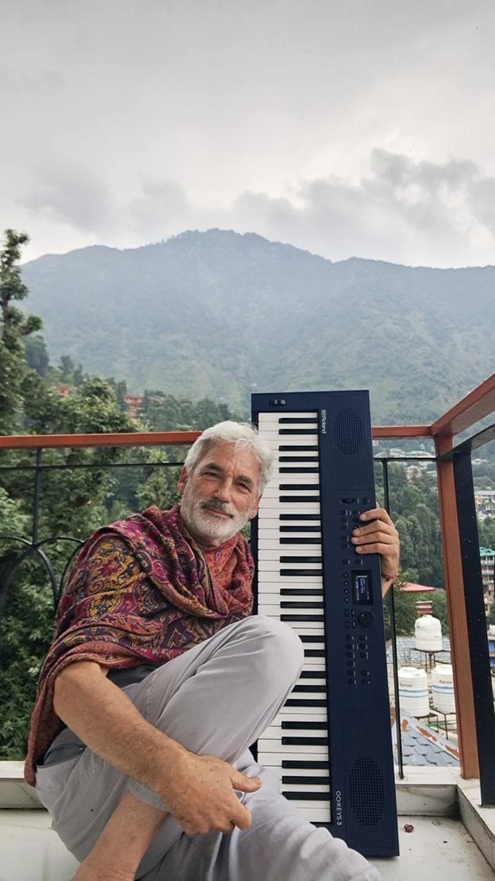 Co-Director Roni Porat playing musical instruments